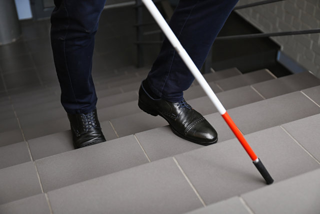 BlindSquare_man with cane.jpg